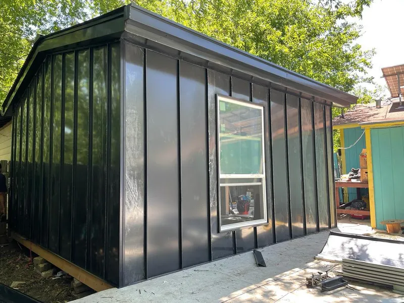 Black standing seam metal wall panels for Roof Inspection in Lincolnshire