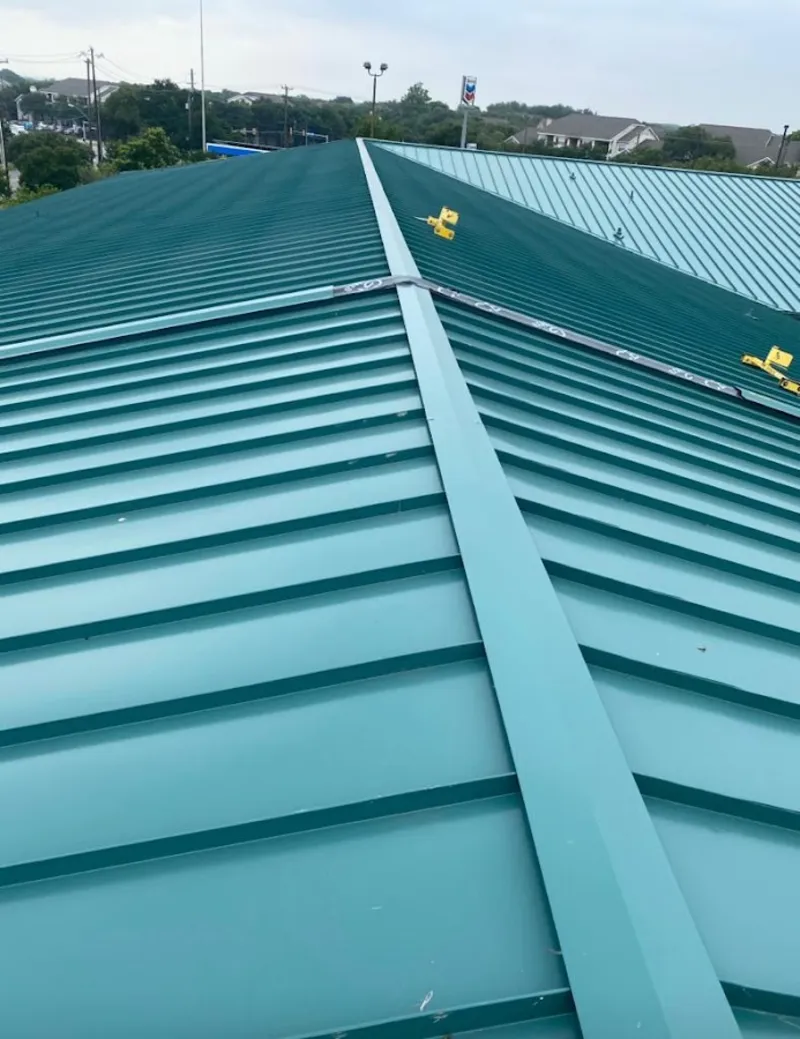 Green commercial metal roof ridge and valley for Metal Roof Repair in Lincolnshire